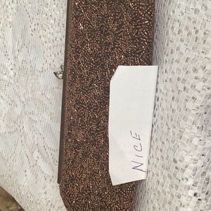 Evening bag , silver chain and kiss clasp.